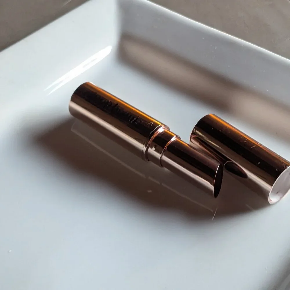 goop Beauty | Clean Nourishing Lip Balm | Garnet: a translucent deep burgundy